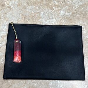 NWOT Black clutch with red and pink tassel